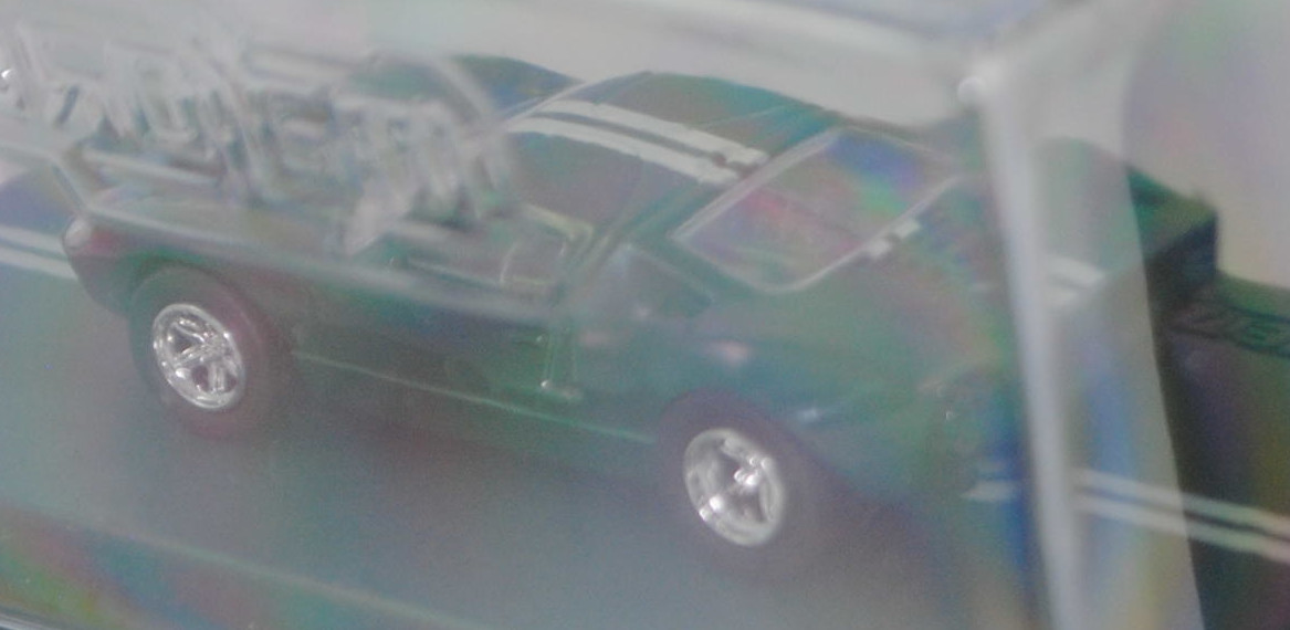 Ford GT40 (1. Generation, Mk I bzw. Mark 1, Modell 1965-1967), moosgrün, innen schwarz, majorette, 1:64, PC-Box im Blister (Collection)