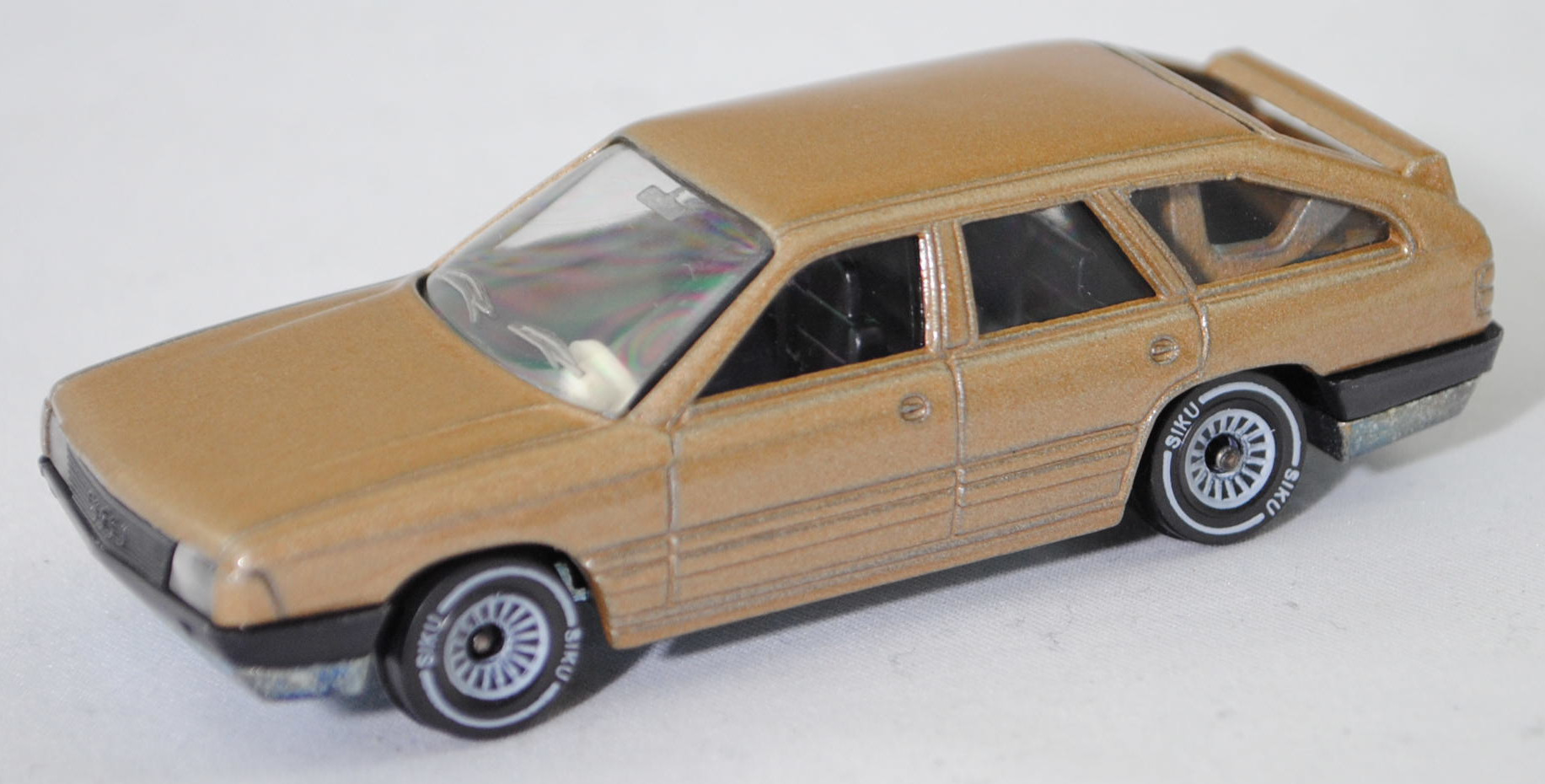 00002 Audi 100 Avant 2.1 (3. Generation, C3, Typ 44, Vorfacelift (Vfl), Modell 1983-1984), hell-riedbraunmetallic, Bpr. 1057, SIKU SUPER, 1:56, m
