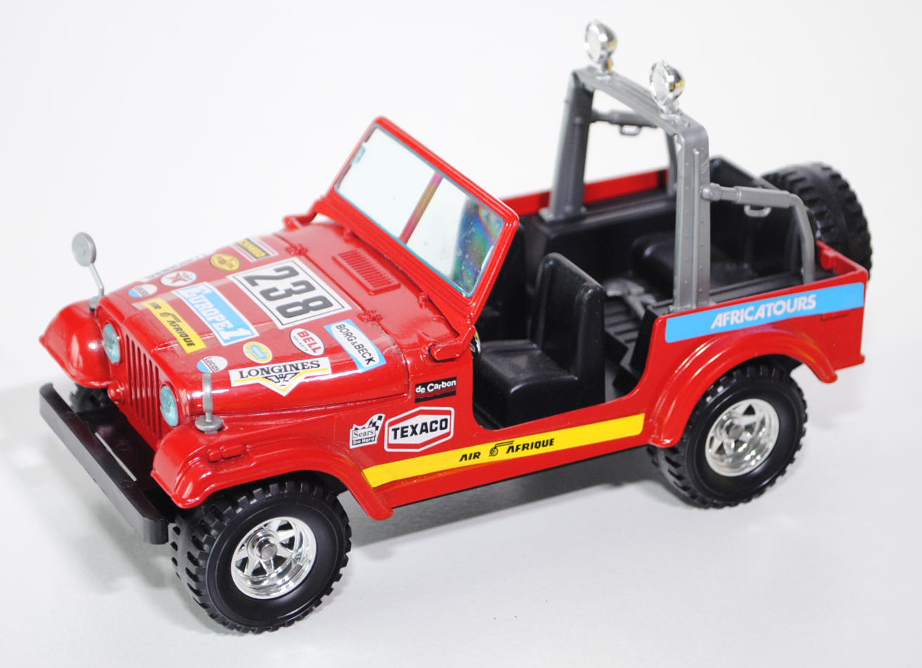 Renegade Jeep CJ-7, Modell 1983, karminrot, EUROPE1 / LOCKHEED / BORG&BECK / LONGINES / 238, Frontsc