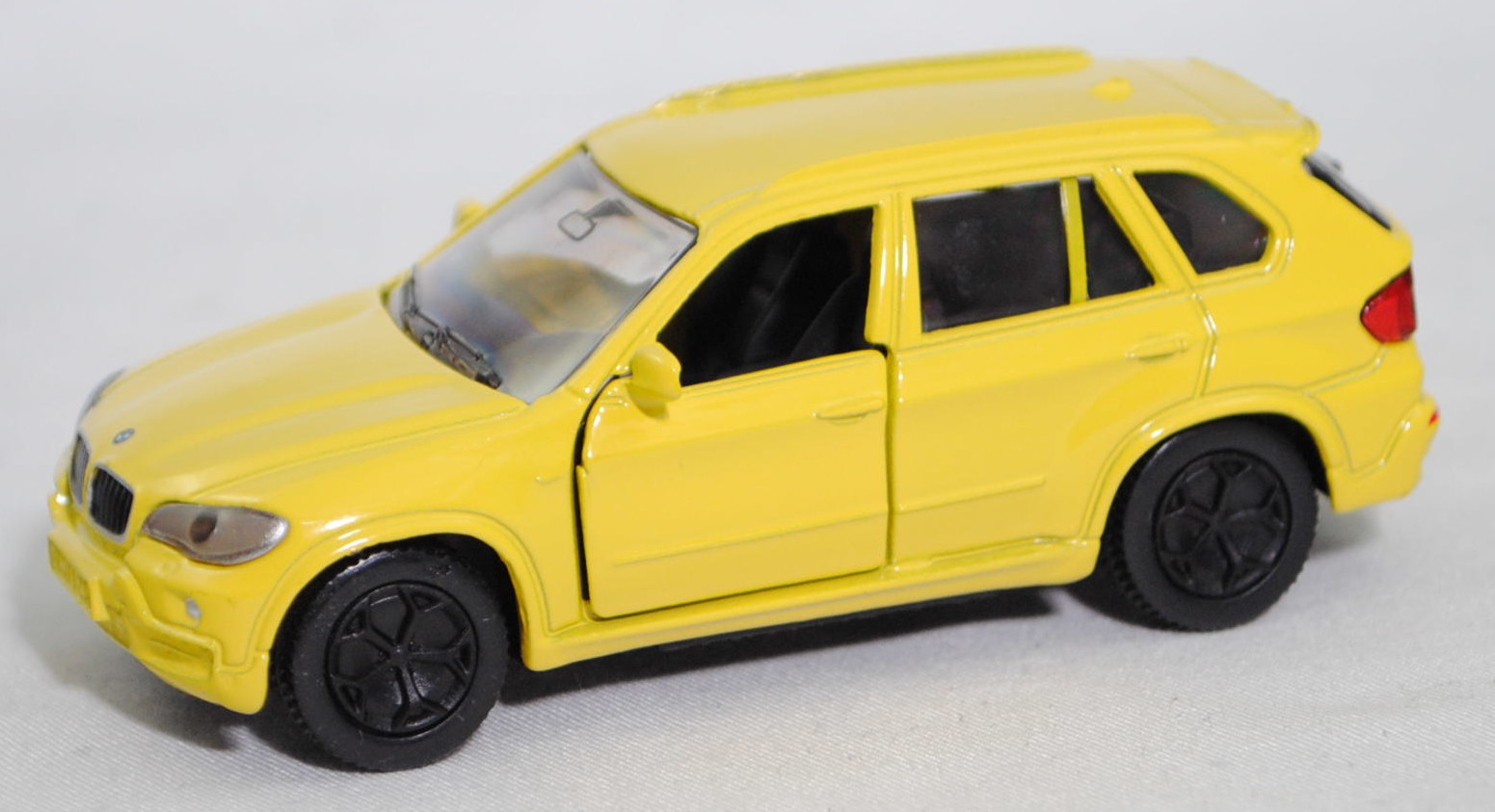 00004 BMW X5 3.0si / xDrive30i (E70, Vorfacelift, Modell 2006-2008 als X5 3.0si bzw. 2008-2010 als X5 xDrive30i), zinkgelb, ohne Bpr. Licensed by / BMW, SIKU SUPER, 1:58, m