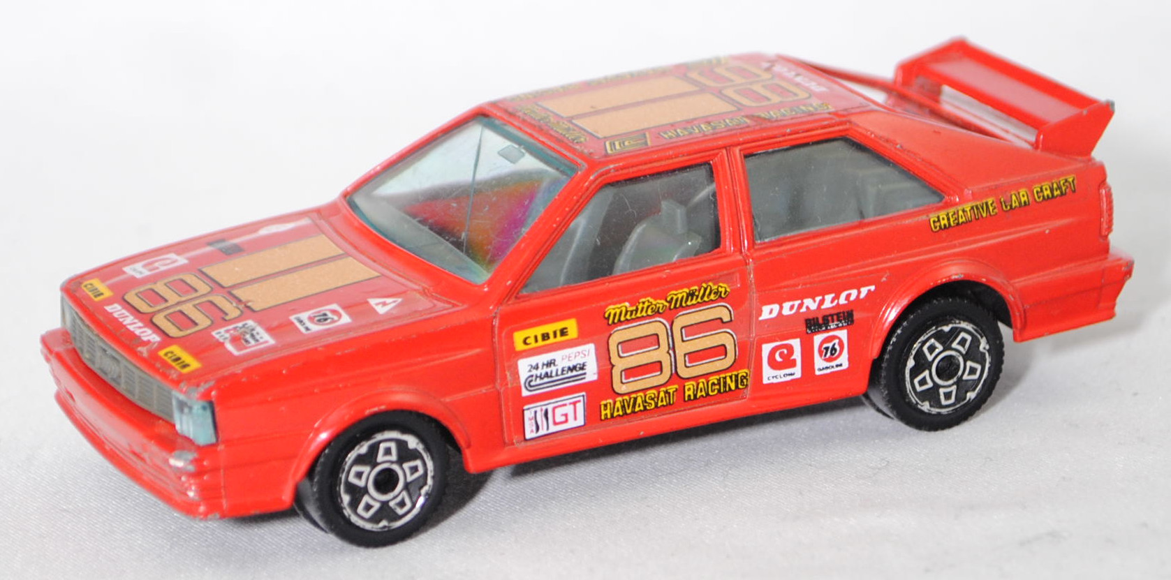 Audi quattro Gruppe 4 (B2 / R1, Typ 85Q, Homologationsnummer 671, Modell 1981-1982), verkehrsrot, Startnummer 86, 24 HR PEPSI CHALLENGE, Bburago DIE CAST METAL, 1:43, m-