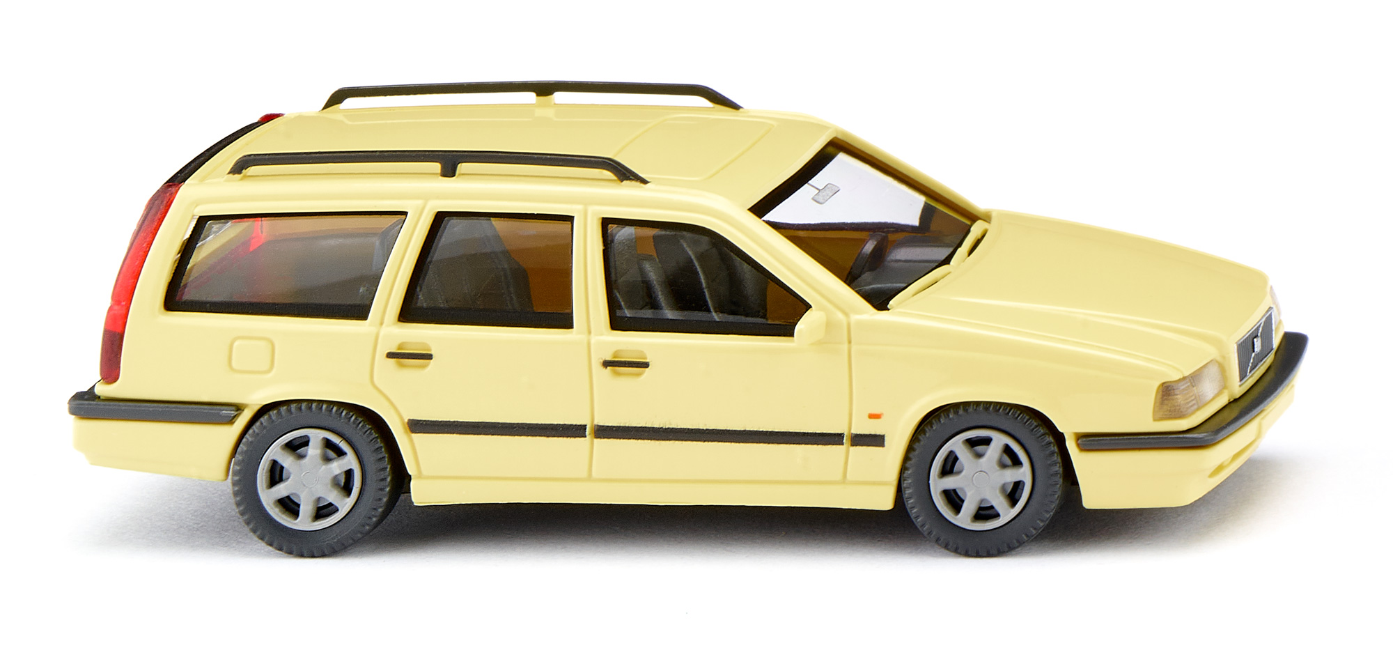 Volvo 850 Kombi (1. Generation, interne Baureihenbezeichnung LW, Code 855, Modell 1993-1996), hellgelb, Volvo 850 und T-5R in silber auf Heckklappe, Wiking, 1:87, mb