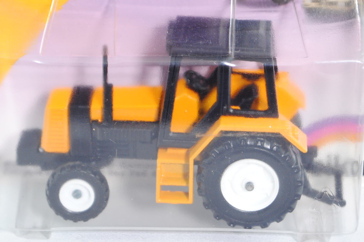 Renault 145-14 TX Traktor (Modell 1981-1986), melonengelb, Sitz schwarz, Lenkrad schwarz, Kabine sch