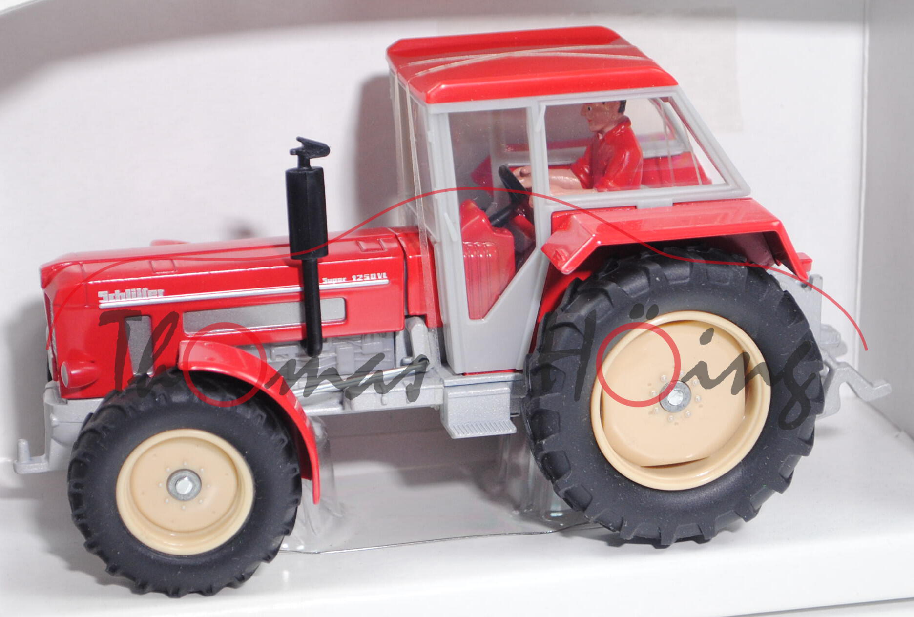 00001 Schlüter Super 1250 VL, Modell 1972-1985, karminrot, mit Fahrer, SCHLÜTER steht vorne, L17P