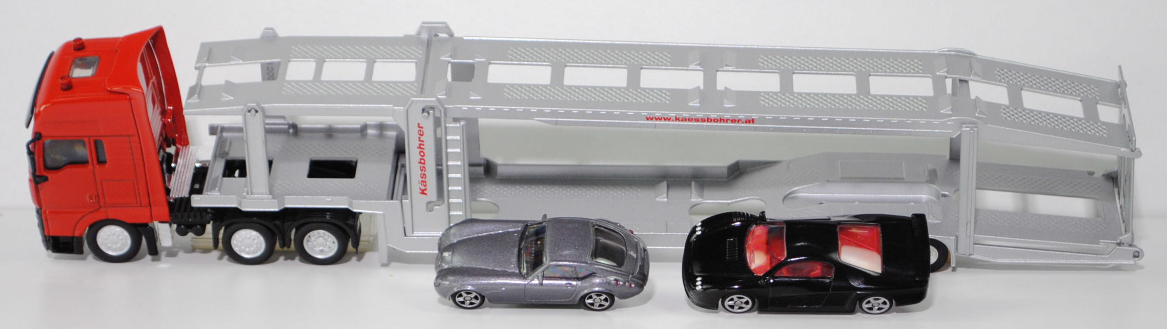 00000 MAN TGA 26.480 XXL mit Kässbohrer Autotransporter ruslan® SP-R 10-18, rot/schwarz/silber; Ladegut: SIKU STORM und Wiesmann GT MF4, SIKU SUPER 1:50, m