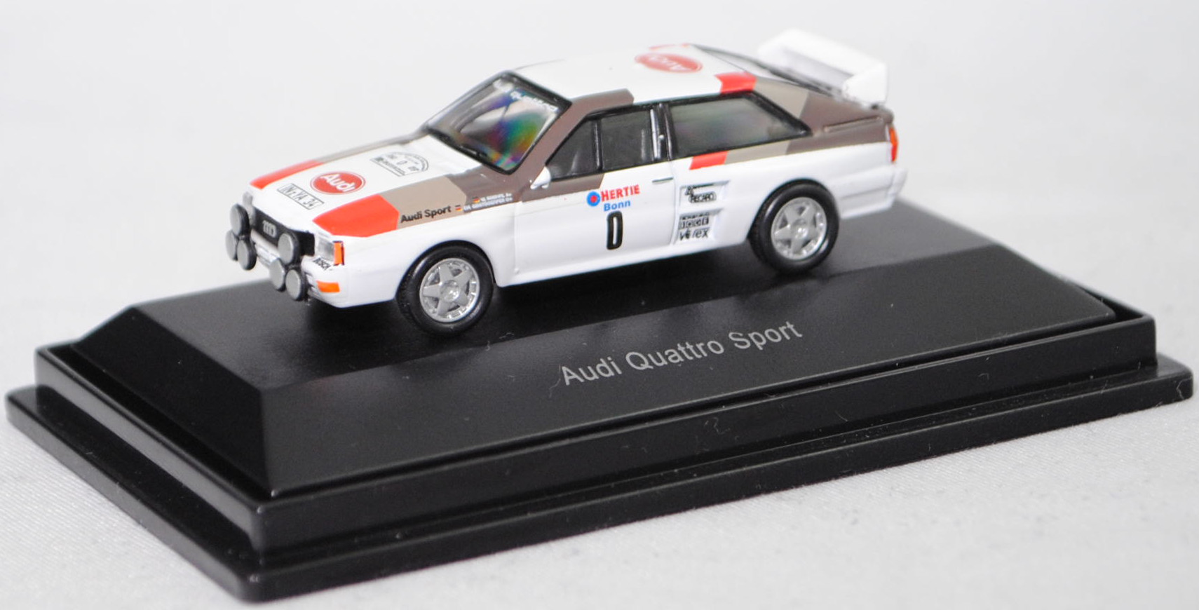 Audi quattro A2 Gruppe B (B2 / R1, Mod. 83-84), weiß, 12. Rallye Köln-Ahrweiler 1983, Startnummer 0, Walter Röhrl / Christian Geistdörfer, Team: Audi Sport, IN-YA 34, Schuco, 1:87, PC-Box
