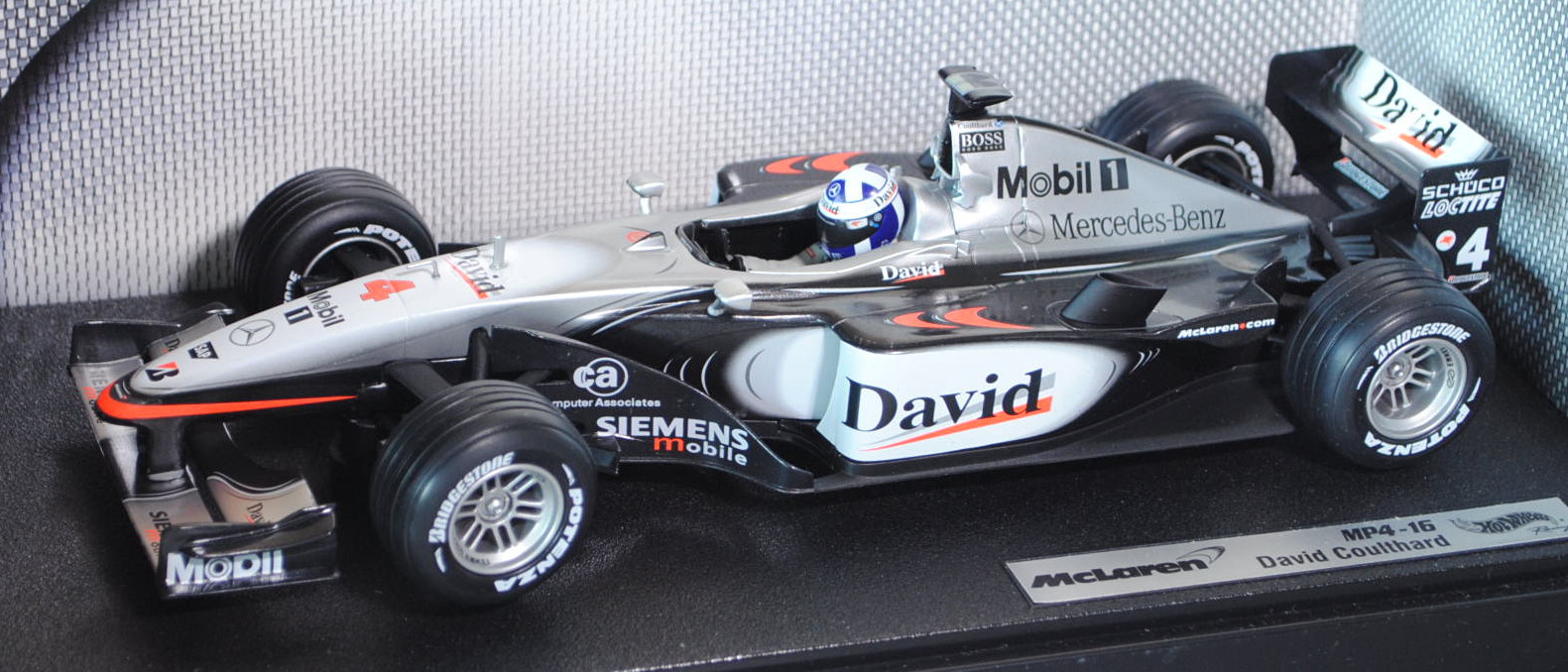 McLaren MP4-16, silber/schwarzgraumetallic, Team West McLaren Mercedes (2. Platz), Fahrer: David Cou