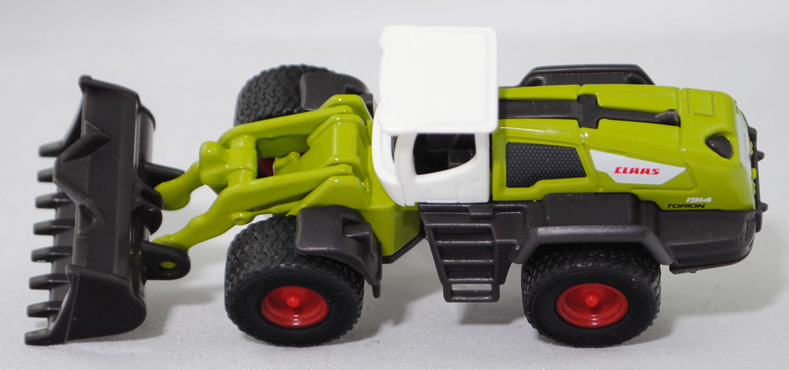 00001 CLAAS Radlader TORION 1914 mit Erdbauschaufel mit Aufreißzähnen (Modell 2017-), reinweiß/claasgrün, seitliche Motorbelüftung Teil der Karosserie, SIKU SUPER, 1:102, P29f