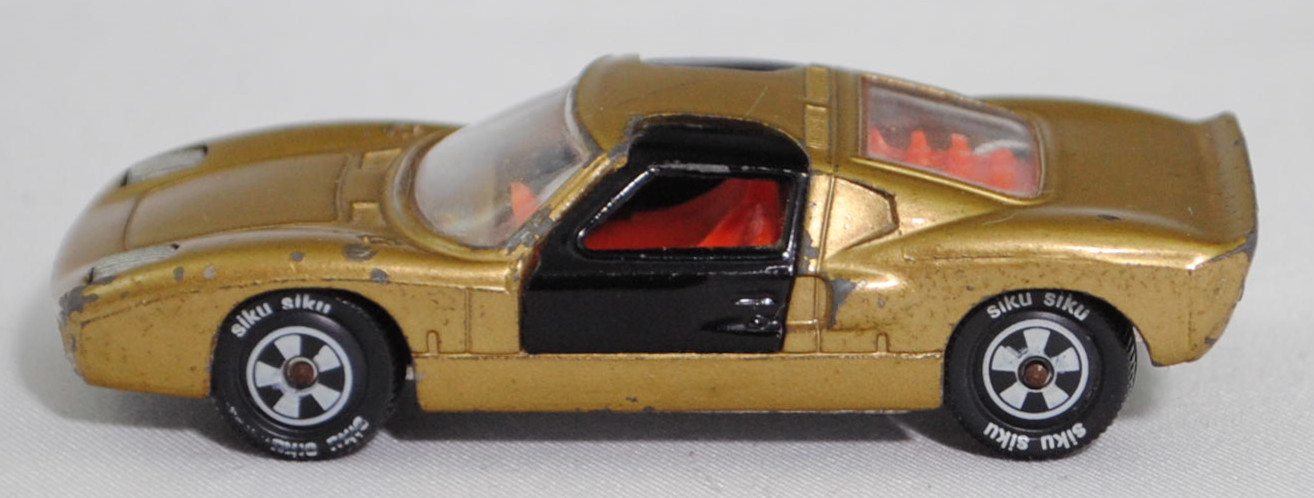 00003 Ford GT40 (Mk I bzw. Mark 1, Modell 1965-1967), Karosserie goldmetallic, Türen schwarz, Bpr. V 296 / Germ, Verglasung klar, R10 weiß, SIKU SUPER, 1:57, m-