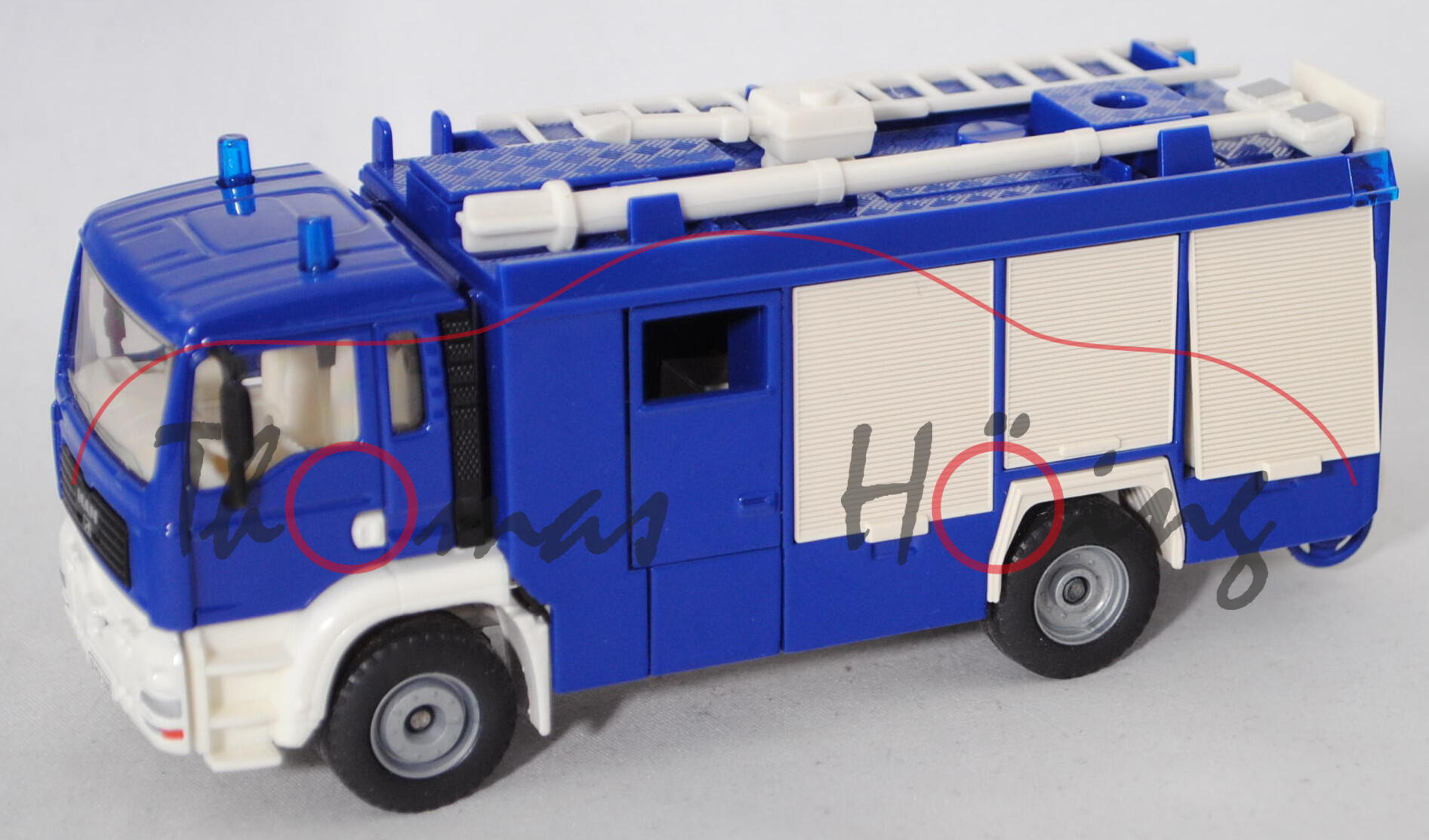 00403 Hilfeleistungslöschfahrzeug HLF 20 auf Fahrgestell MAN TGA 18.460 M, blau/weiß, SIKU, 1:55