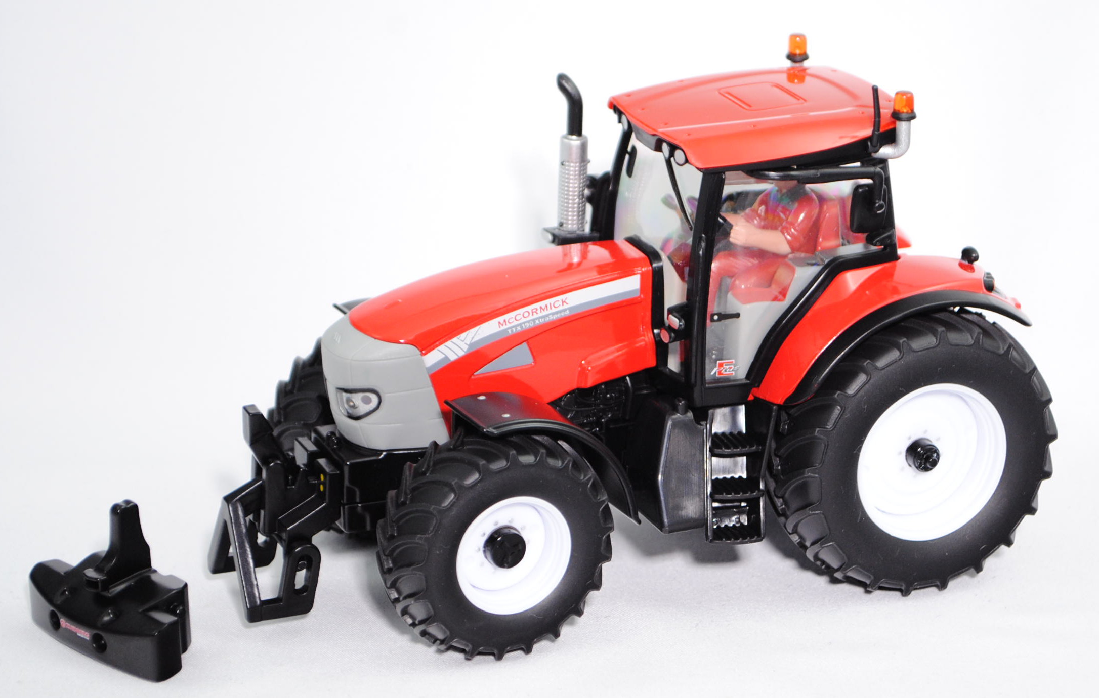 McCormick TTX 190 XtraSpeed Traktor (Modell 2008-2013), verkehrsrot/verkehrsgrau, mit Fahrer im rote