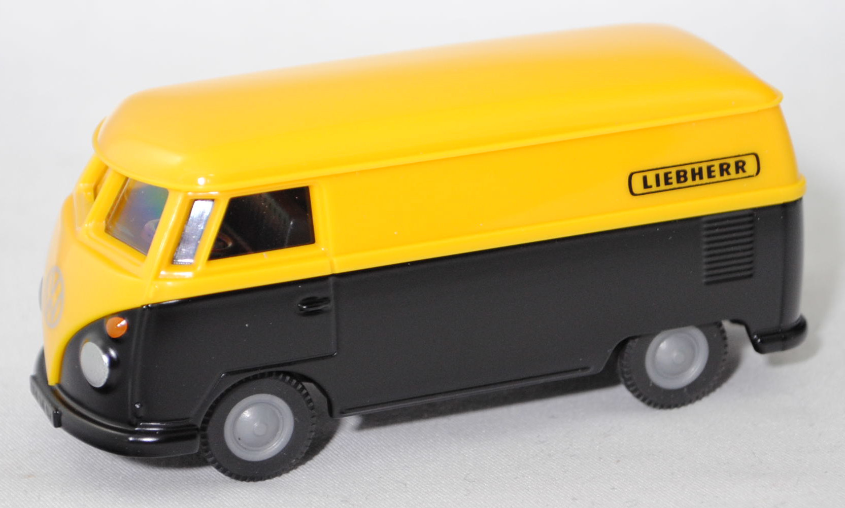 00401 VW Transporter 1200 Kastenwagen (Typ 2 T1, Mod. 63-64), gelb/schwarz, LIEBHERR, SIKU, 1:50, Werbebox