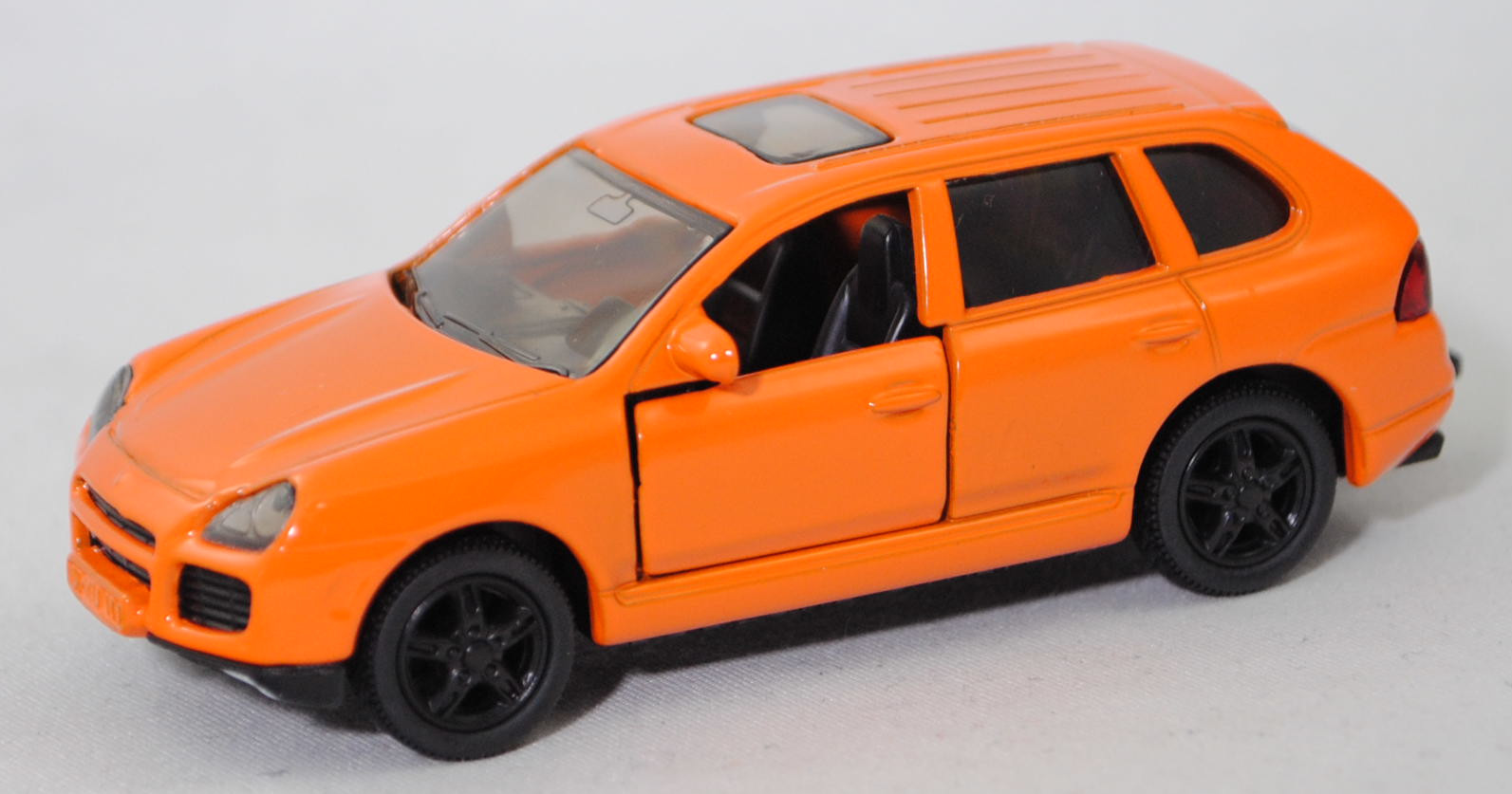 00001 Porsche Cayenne Turbo (1. Generation, Typ 9PA, Vorfacelift, Modell 2002-2006), hell-tieforange, Sicke auf Heckklappe in Höhe Heckscheibe, SIKU SUPER, 1:57, m