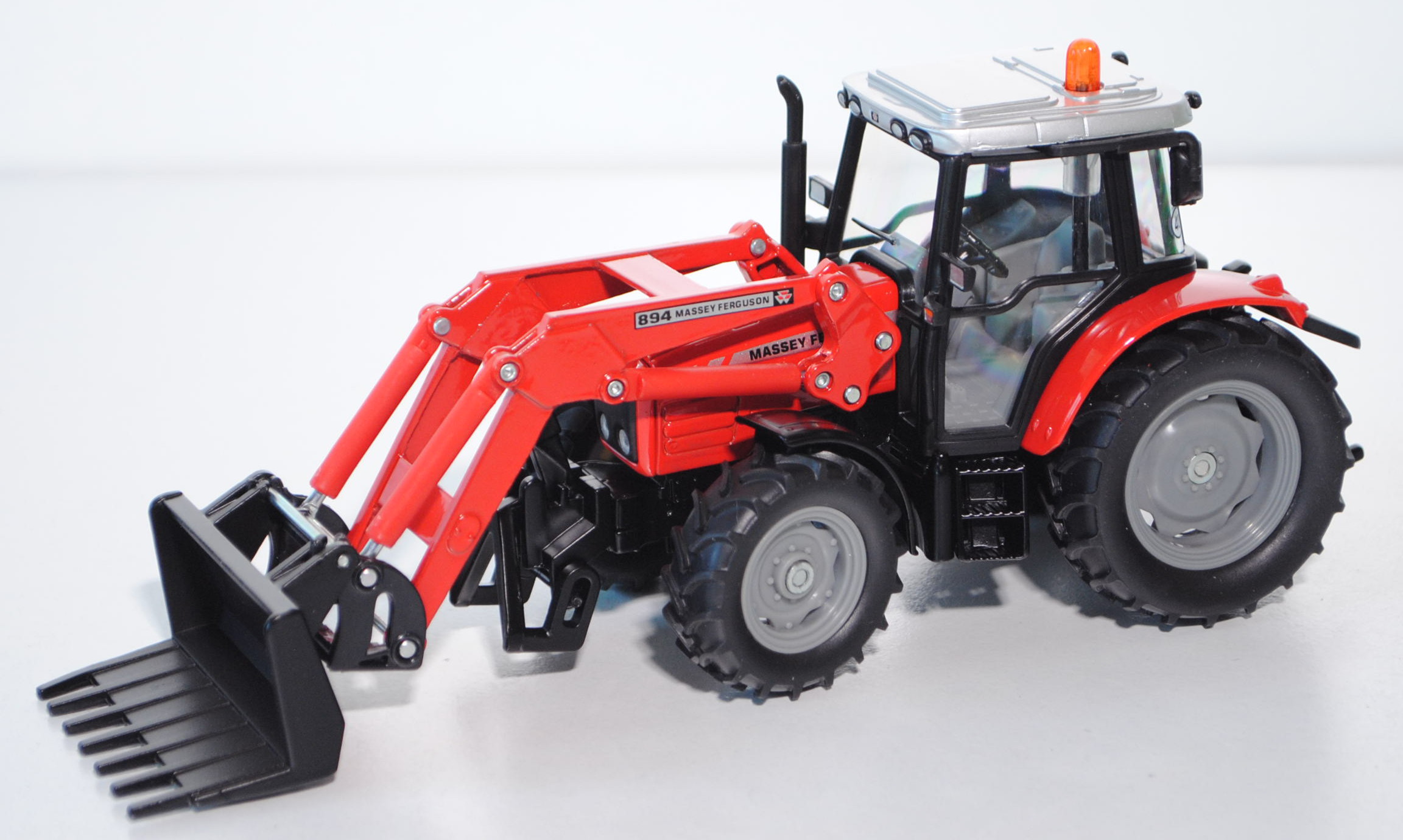 00003 Massey Ferguson MF 5455 mit Frontladergabel und Wechselladersystem, rot, L17mpK