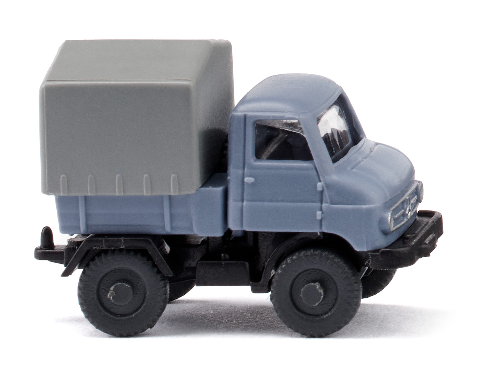 Mercedes-Benz Unimog U 32 (Baureihe 411 bzw. Ur-411, mit Westfalia Ganzstahlfahrerhaus Typ DvF, Modell 1957-1961) mit Pritsche und Plane, taubenblau, N-Spur, Wiking, 1:160, mb