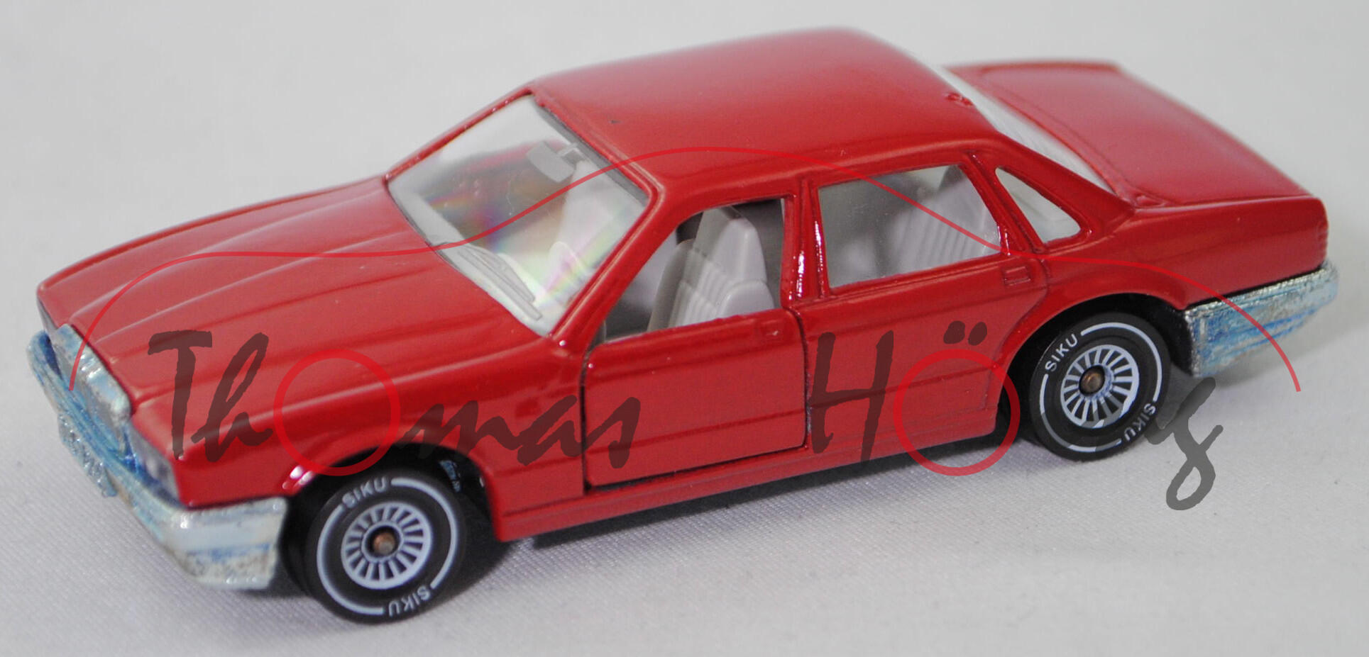 00004 Jaguar Sovereign 3.6 (XJ40, Modell 1986-1989), iberischrot, innen lichtgrau, SIKU, 1:58, m-