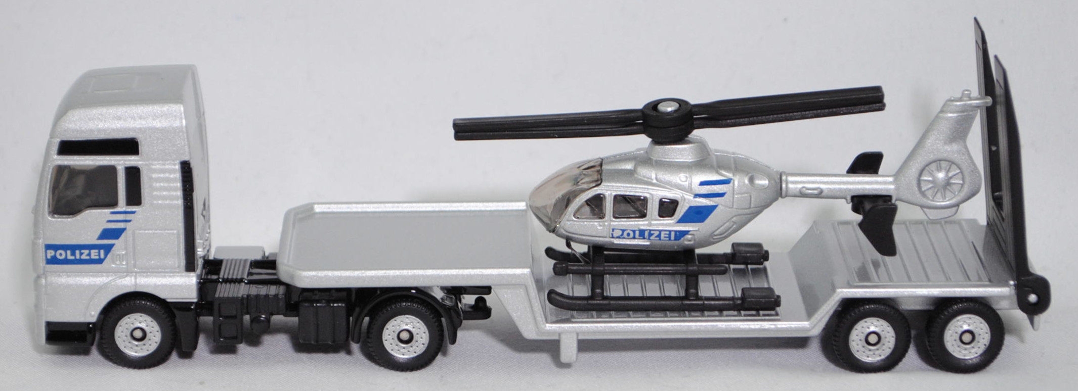 00000 MAN TGX 18.580 D38 XXL (Modell 2017-2019) mit Sattelauflieger und Polizei-Hubschrauber Eurocopter EC 135 T1 (Modell 1996-2002), silber, POLIZEI, SIKU SUPER 1:87, L17mpK