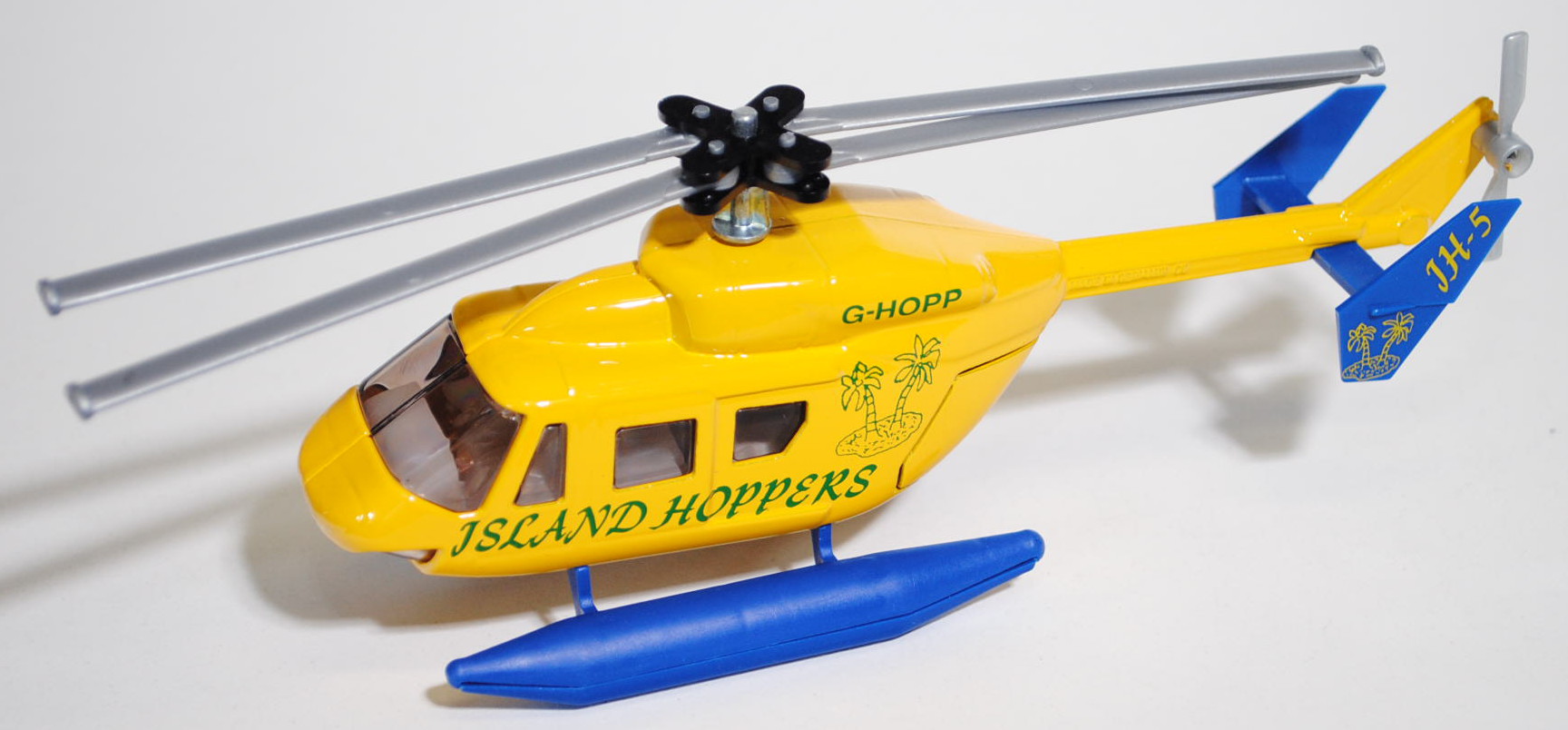 00600 Hubschrauber BK 117 mit Schwimmer, kadmiumgelb/saphirblau, ISLAND HOPPERS / G-HOPP / JH-5, Sch