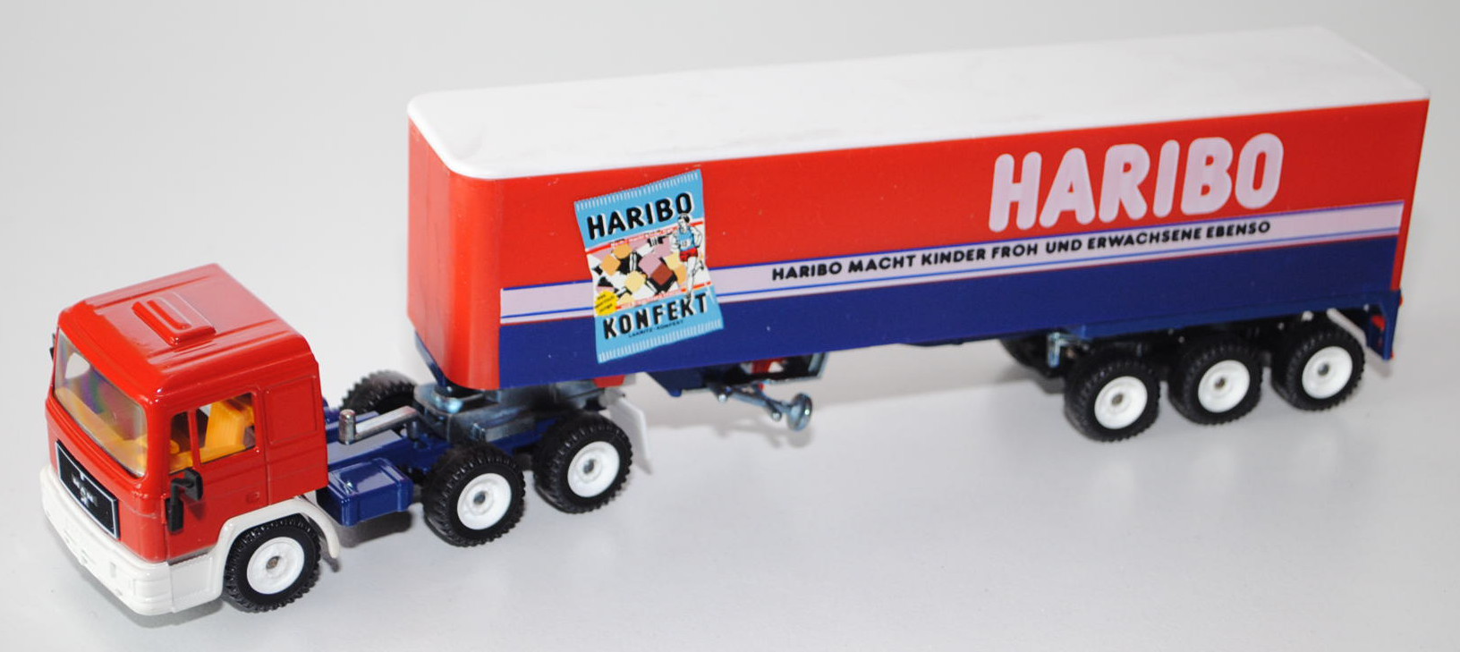 MAN F90 Koffer-Sattelzug, verkehrsrot/cremeweiß/saphirblau, HABIBO / HARIBO MACHT KINDER FROH UND ER