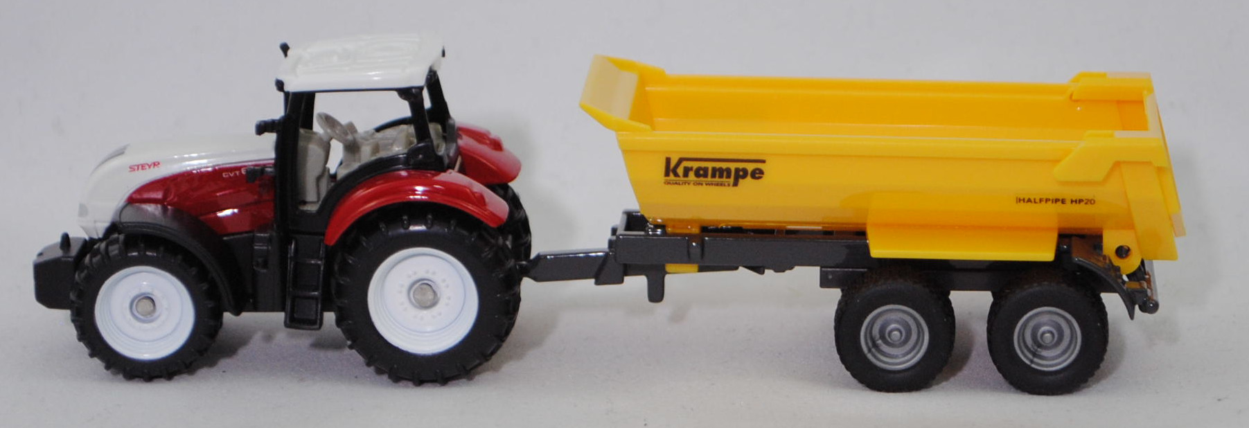 00000 Steyr 6230 CVT ecotech (5. Generation, Modell 2011-2015) mit Krampe Halfpipe Tandem Erdbaukipper HP 20 (Modell 1999-), weiß/rot und gelb/grau, SIKU SUPER, P29f