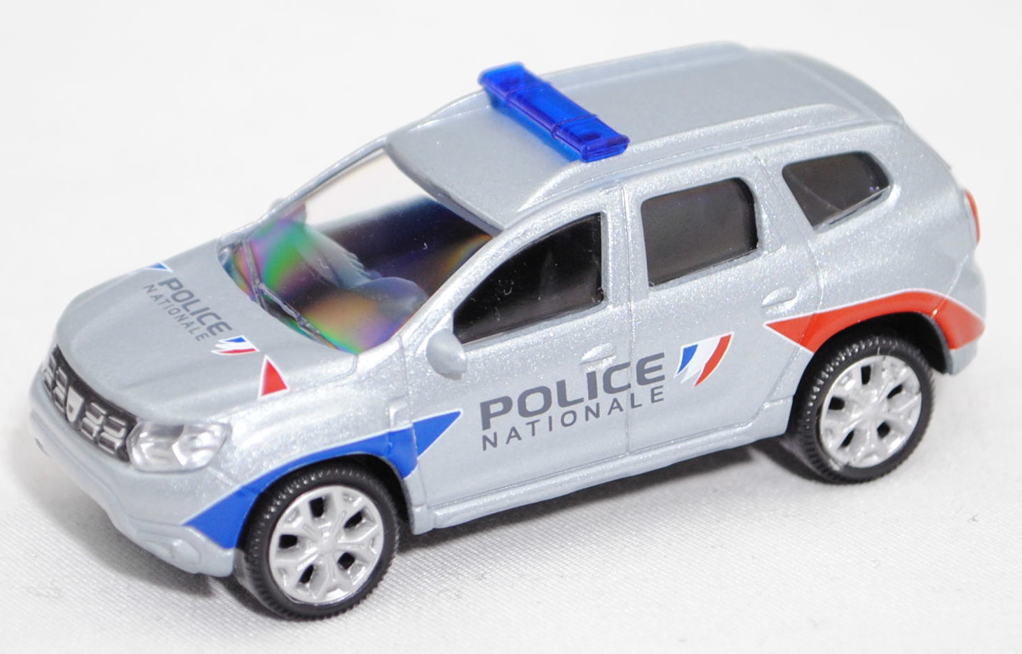 Dacia Duster TCe 150 / Blue dCi 115 Prestige 4x4 (Phase II bzw. Facelift 1, Modell 2021-2022) Polizei, blausilbermetallic, POLICE / NATIONALE, Norev Multigam Serie, 1:64, mb