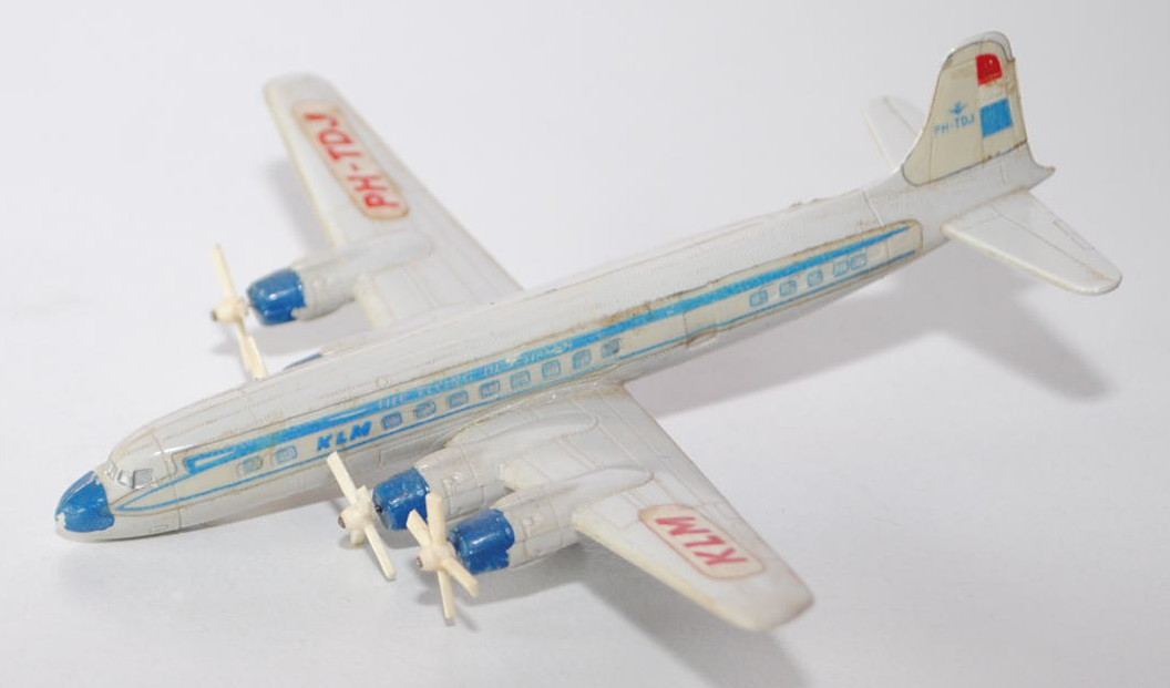 Douglas DC-7 Seven Seas, lichtgrau, KLM (Royal Dutch Airlines), Fahrwerk vorne weg, Propeller cremew