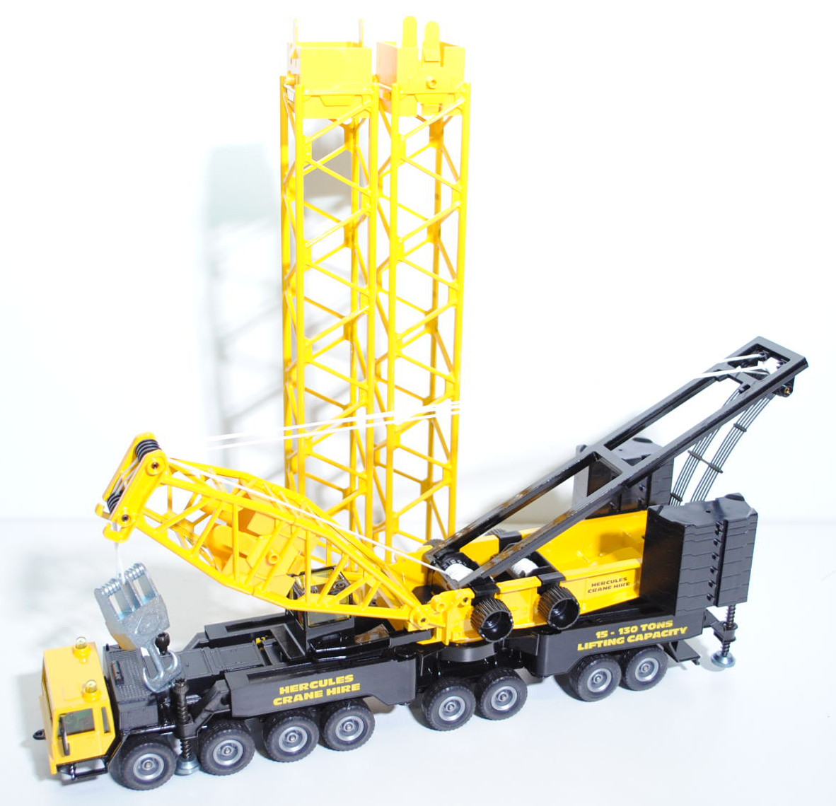 99900 Gittermastkran Liebherr LG 1550, signalgelb/schwarz, HERCULES / CRANE HIRE / 15 - 130 TONS / L