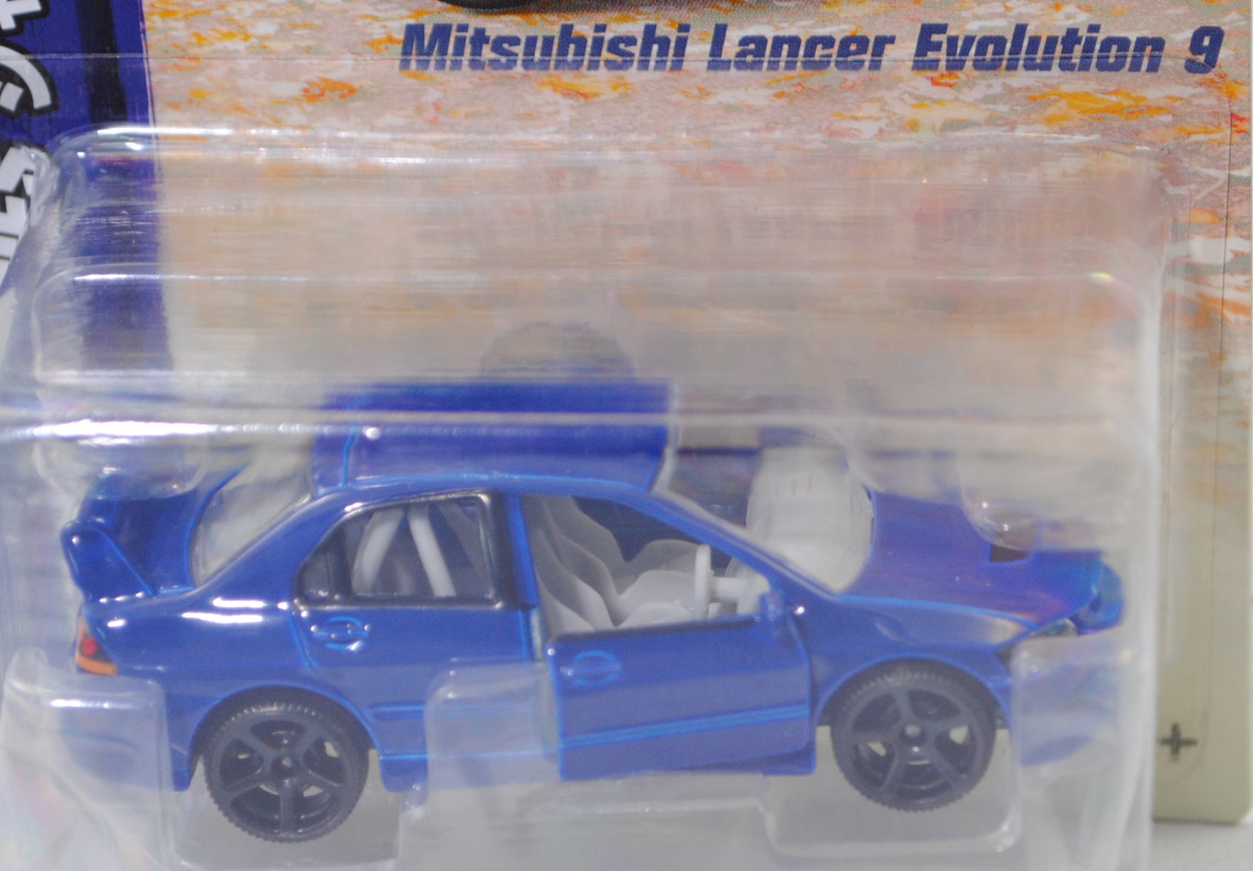 Mitsubishi Lancer Evolution IX MR Tuned by Ralliart (Modell 2005-2007), blau, majorette, 1:58, Blister