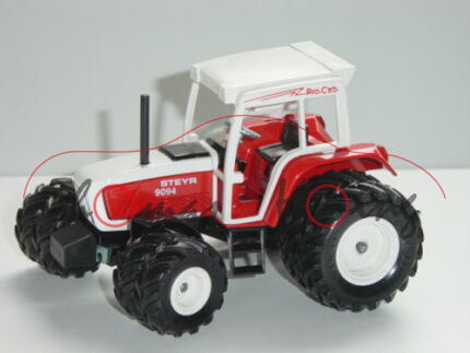 Steyr 9094 Traktor (Modell 1993-1995) mit Zwillingsbereifung, reinweiß/verkehrsrot, ProCab in rot au