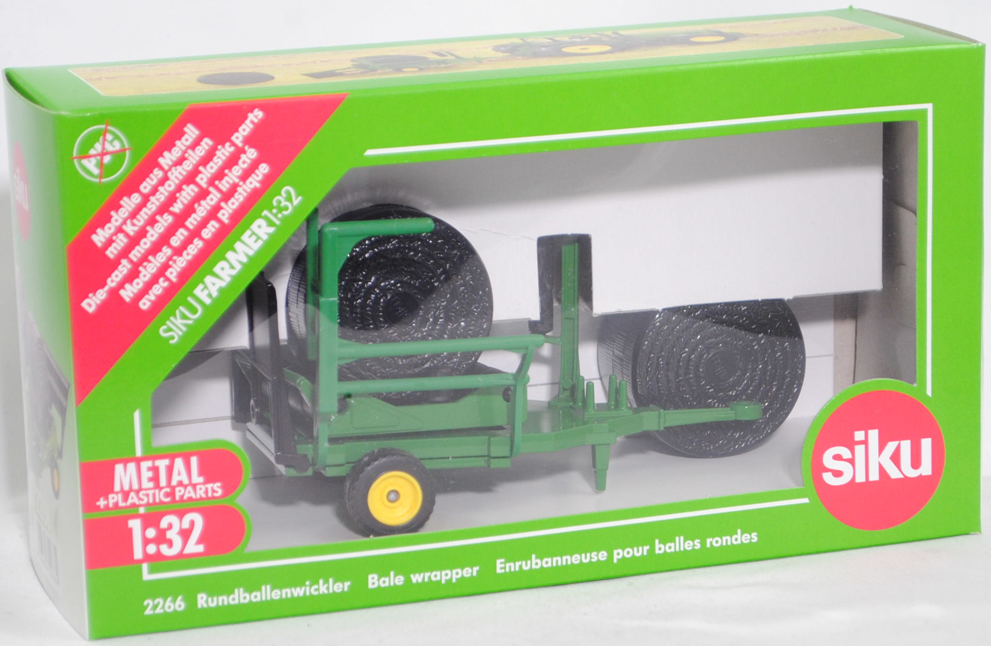 00703 IE Rundballenwickler, smaragdgrün, Modell genietet, LKW41 zinkgelb, Zubehör: 2 Stück Rundballen schwarz, SIKU FARMER, 1:32, L16nmp (Limited Edition)