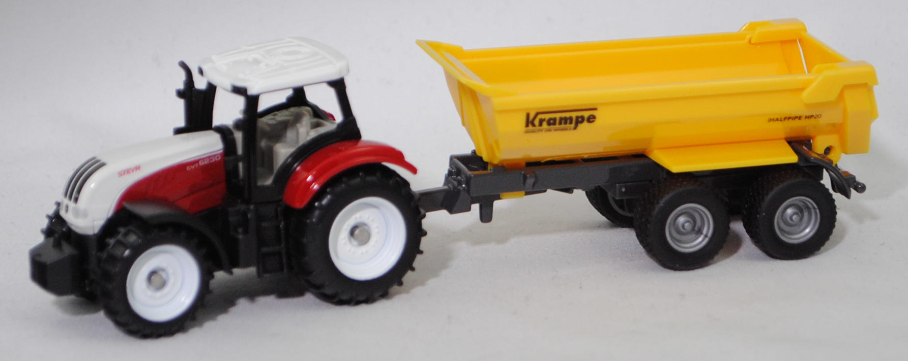 00000 Steyr 6230 CVT ecotech (5. Generation, Modell 2011-2015) mit Krampe Halfpipe Tandem Erdbaukipper HP 20 (Modell 1999-), weiß/rot und gelb/grau, SIKU SUPER, P29f