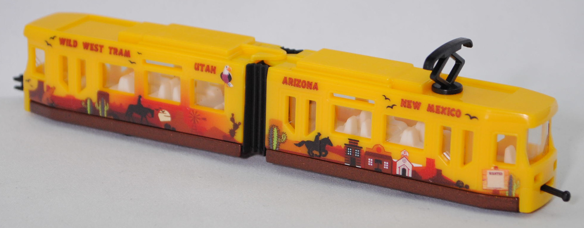 00014 ADtranz GT4N-ZR Niederflur-Straßenbahn (Modell 1997-2009), Wagenkästen verkehrsgelb, WILD WEST TRAM UTAH ARIZONA NEW MEXICO, SIKU SUPER, 1:117, P29f