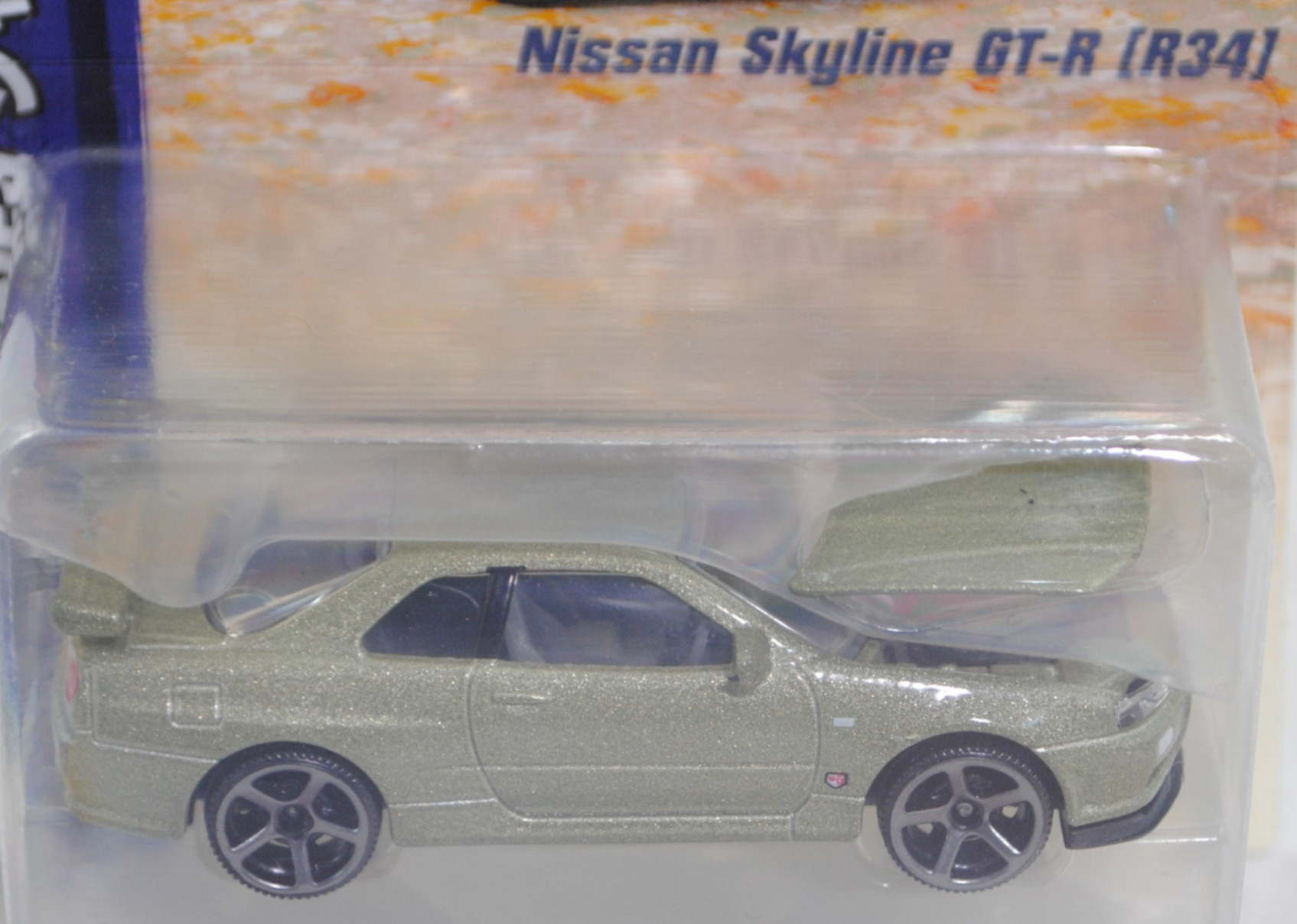 Nissan Skyline GT-R (Baureihe R34, Modell 1999-2002), hell-schilfgrünmetallic, majorette, 1:59, Blister