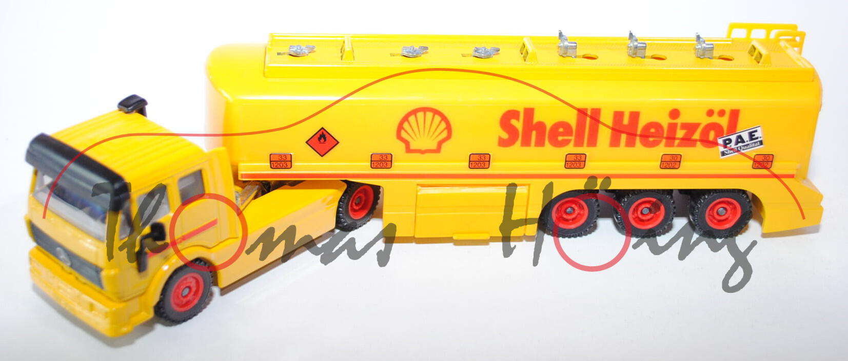 00002 Mercedes SK Tankzug mit TOPAS-Aufbau, hell-signalgelb, Shell Heizöl, innen grau, L14a