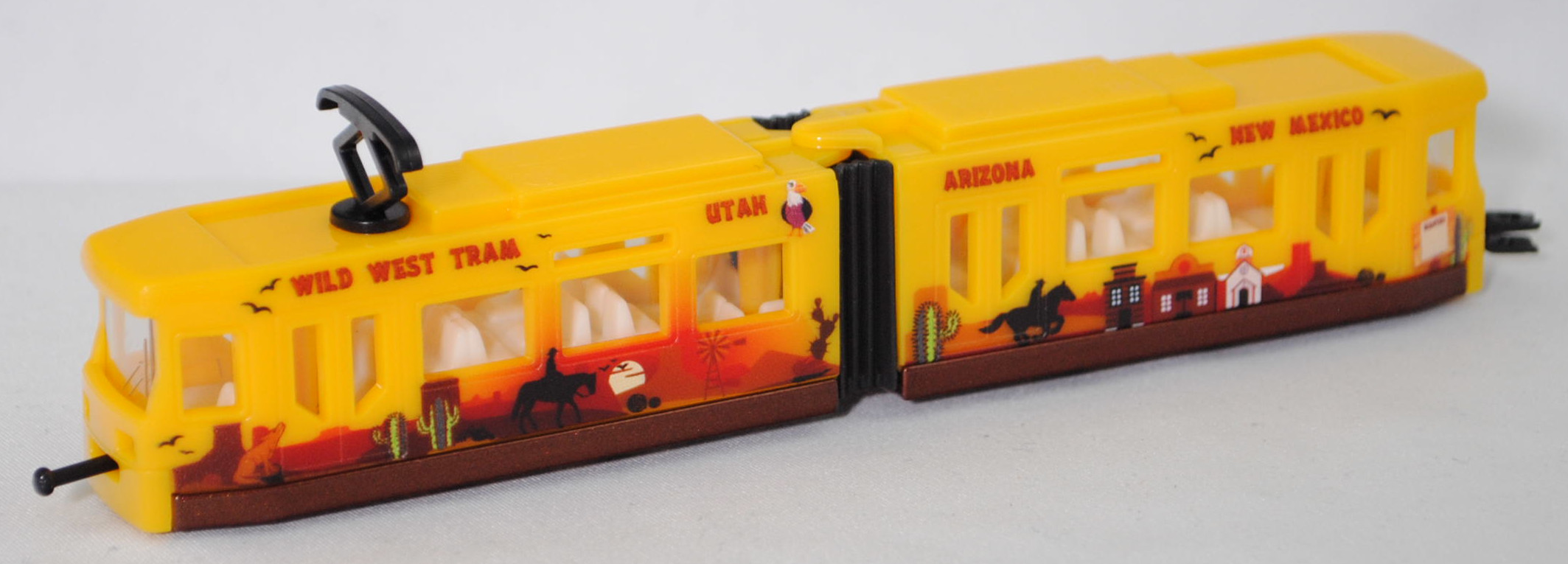 00014 ADtranz GT4N-ZR Niederflur-Straßenbahn (Modell 1997-2009), Wagenkästen verkehrsgelb, WILD WEST TRAM UTAH ARIZONA NEW MEXICO, SIKU SUPER, 1:117, P29f