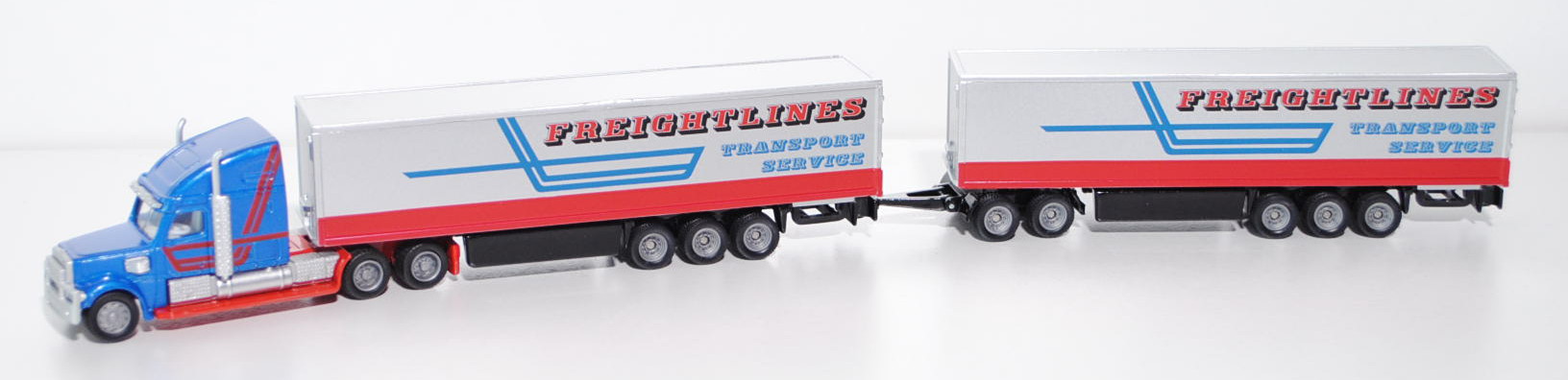 00000 FREIGHTLINER CORONADO CC132 Road Train, signalblaumetallic/rot/silber, L17mpK