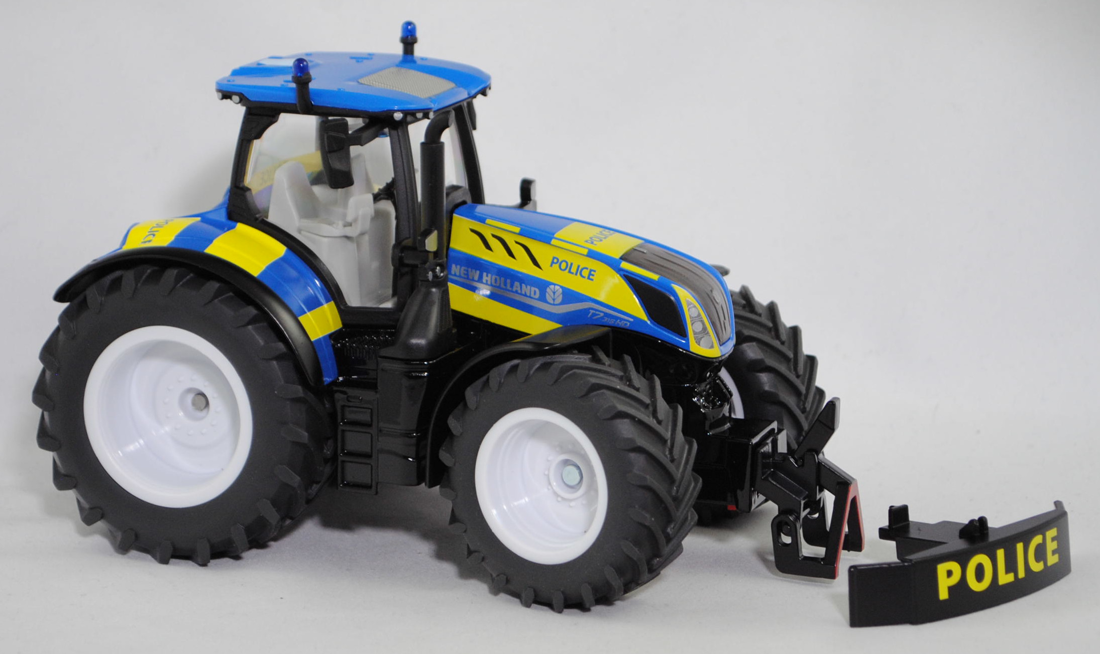 00000 New Holland T7.315 HD AC New Generation (2. Generation, Modell 2021-) Polizei Traktor, hell-signalblau/mattschwarz, POLICE, SIKU FARMER 1:32, L17mpK