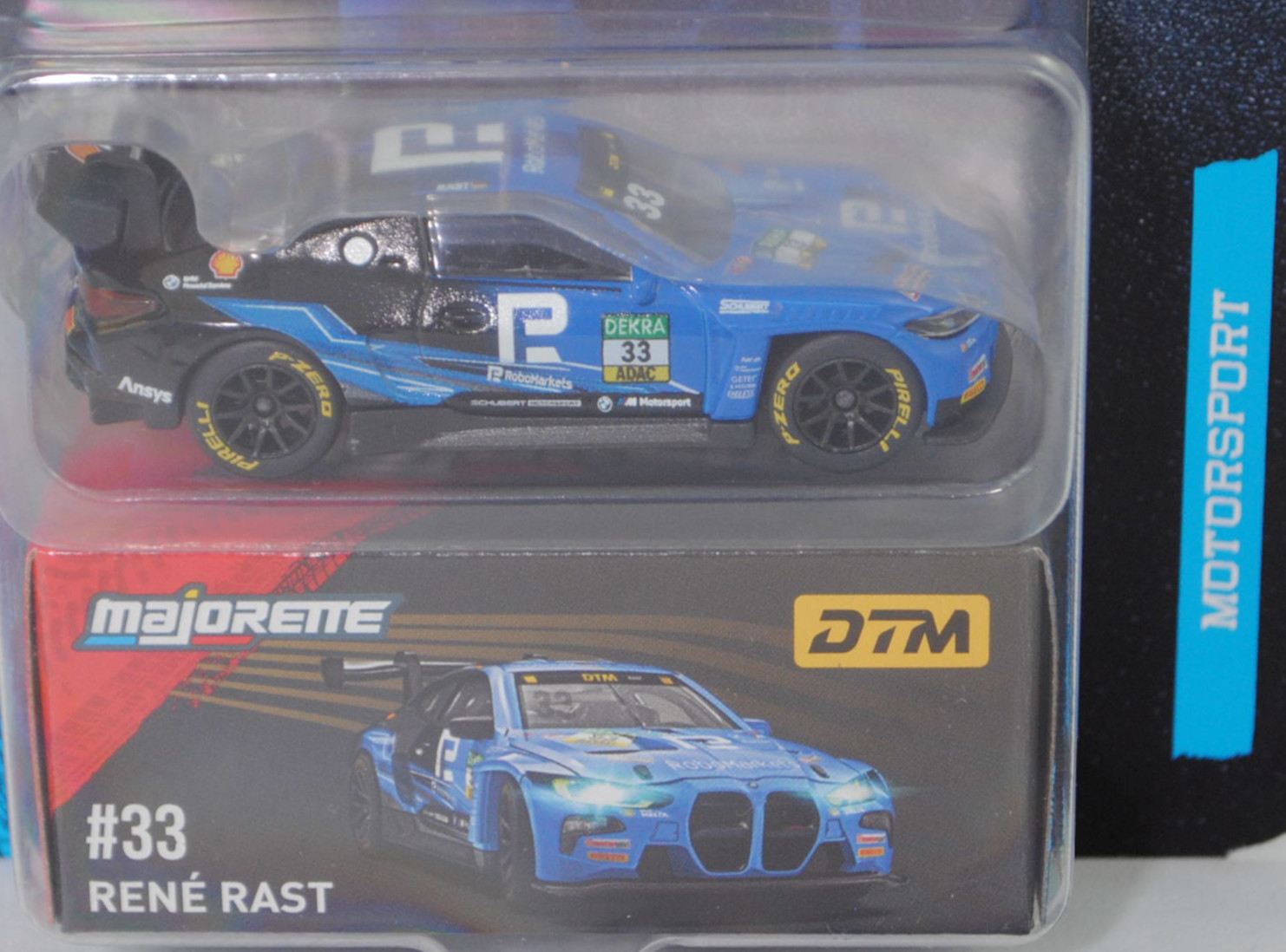 BMW M4 GT3 EVO (G82, Homologationsnummer GT3-053, Modell 2024-) (Nr. 257I), blau/schwarz, DTM 2025, René Rast, Nr. 33, Schubert Motorsport, majorette, 1:65, Blister